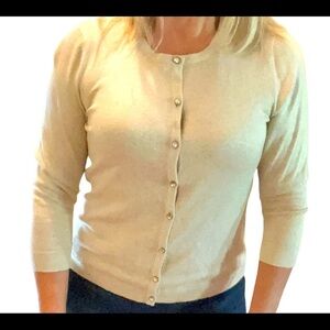Light golden/tan cardigan sweater with gold metallic threads throughout, small